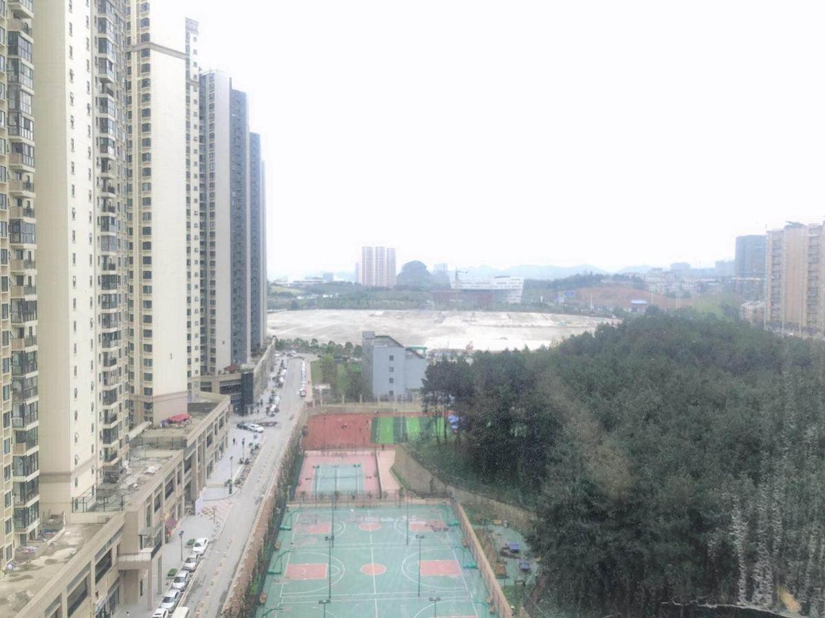 IU Hotel Guiyang Olympic Sports Center China Resources Vientiane Bagian luar foto